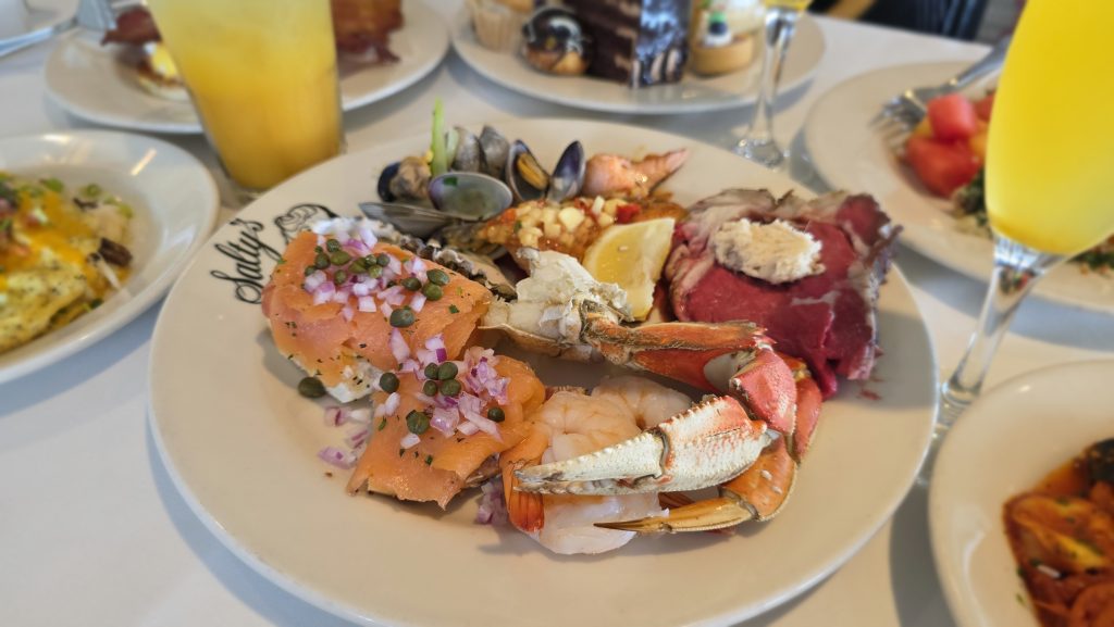 Brunch Plates with seafood, prime rib, desserts, salads and Mimosas